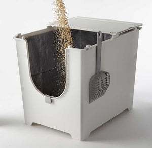 Once the Flip Tarp Liner is secured fill the Flip Litter Box with clumping cat litter.